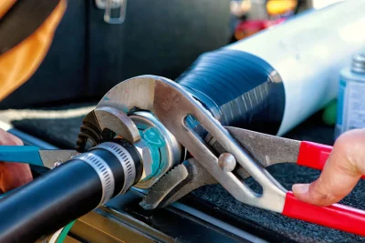 Pipe repair service using professional plumbing tools in Wildwood, Georgia